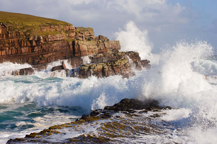 Waves crashing over rocks, coastline near Point of Stoer, Assynt, North west Scotland